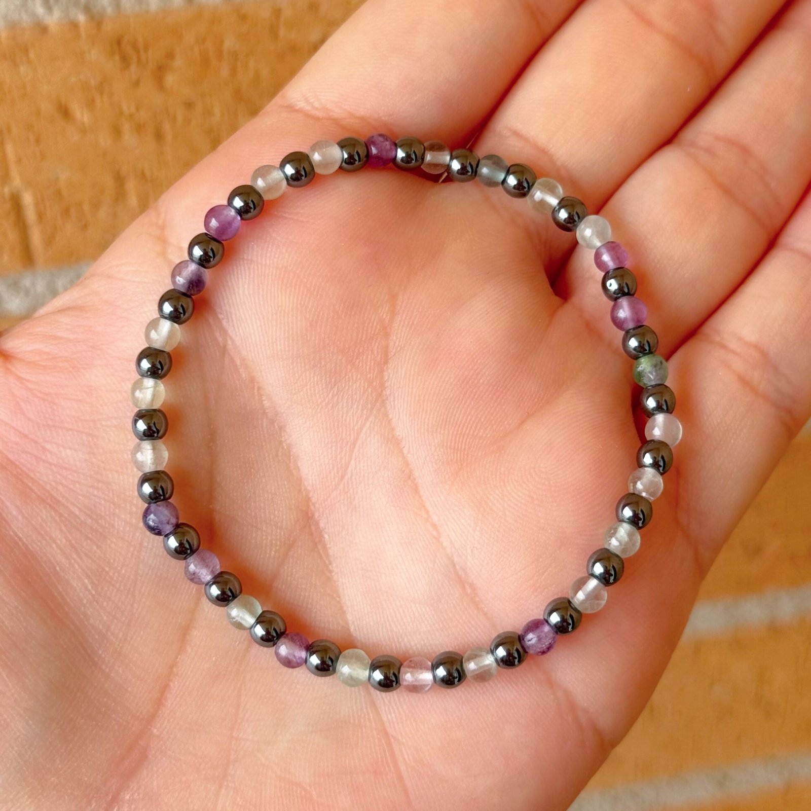 Pulsera bolas ESTUDIOS (fluorita arcoíris y hematite)
